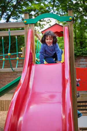 Child playing on outdoor playground