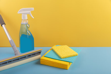 Set for cleaning windows on blue background