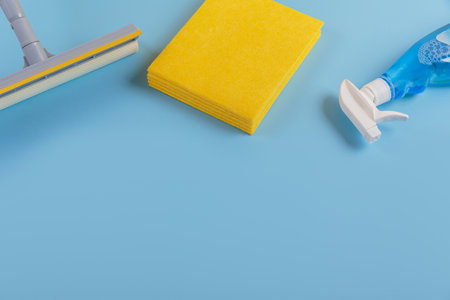Set for cleaning windows on blue background