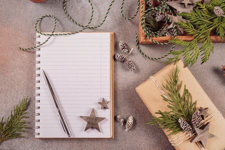 Notebook with pen, handmade gift box and Christmas wooden decor