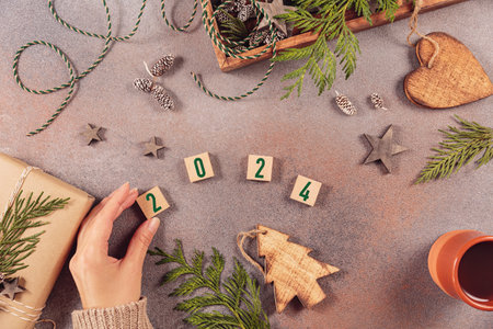 Handmade gift box, Christmas decor and womans hand adding up numbers 2024の写真素材