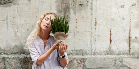 Attractive blonde woman with eyes closed