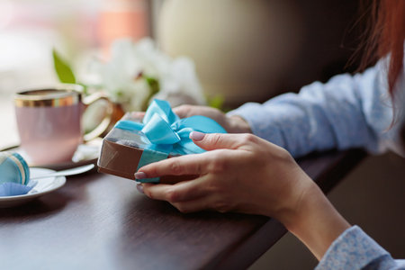 Romantic Gift in Cafe for womanの写真素材
