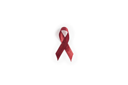 Burgundy myeloma awareness ribbon on white background