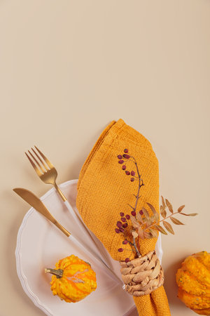 Autumn table setting with pumpkin decorationsの写真素材