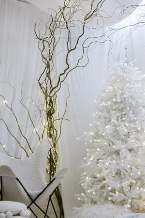 Modern white holiday interior with cozy knitsの写真素材