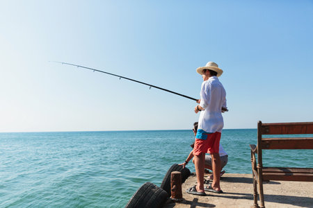 Coastal fishing adventure on a bright summer dayの写真素材