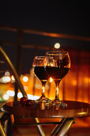 Two black cherry drinks on the balconyの写真素材