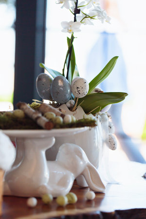 Elegant Easter Floral Arrangement with Decorative Eggs