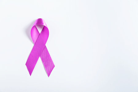 Purple pancreatic cancer ribbon on white backgroundの写真素材