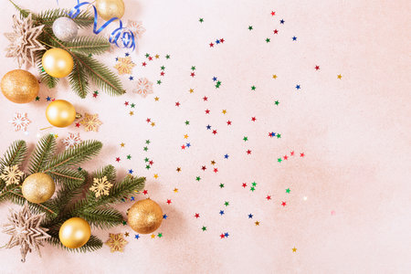 Festive Christmas and New Year background with gold baublesの写真素材