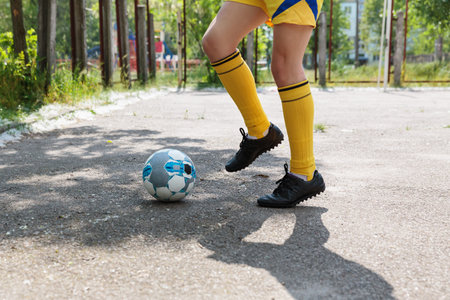 Teenage footballer practicing foot skillsの写真素材