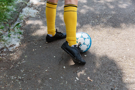 Soccer player controlling the ball with his footの写真素材