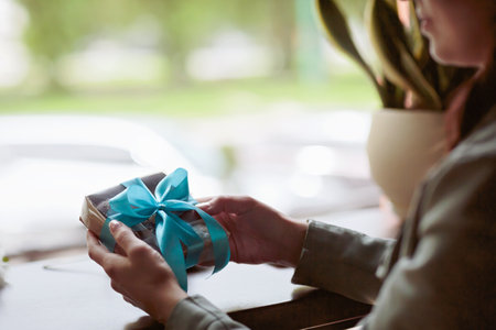 Romantic Gift in Cafe for womanの写真素材