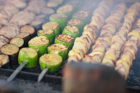 Close-up of Zucchini and Potato Skewers Grillingの写真素材