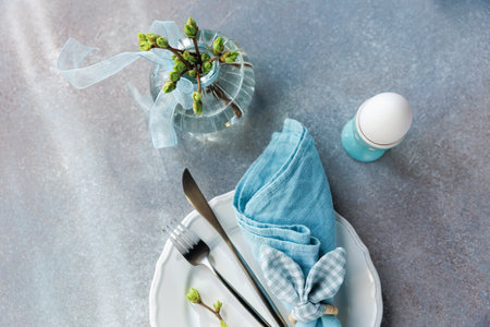 Easter Table with Spring Flowers and Egg Holder