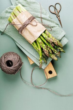 Asparagus Bundle with Twine and Scissorsの写真素材