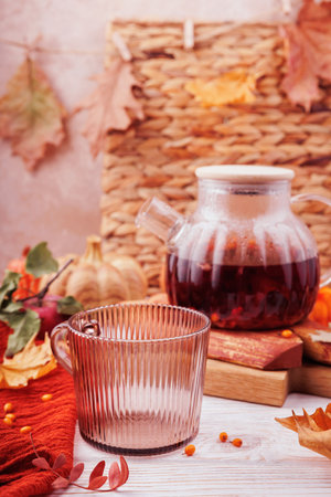 Vertical Fall Composition with Herbal Tea and Rustic Decorの写真素材