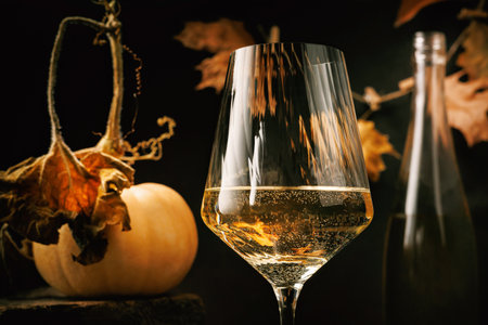 Thanksgiving Still Life with White Wine and Leavesの写真素材