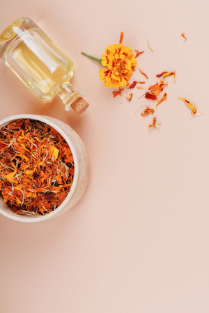 Natural Calendula Oil with Fresh Tagetes Flowerの写真素材