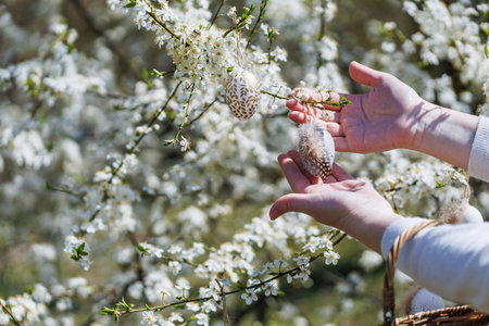 Hanging Feathered Easter Egg on Spring Tree