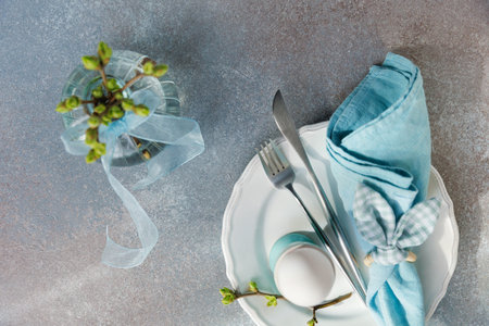 Easter Place Setting with Blue Linen and Buds