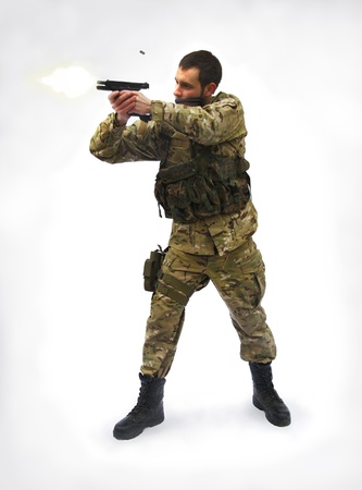 shooting soldier white backgroundの写真素材