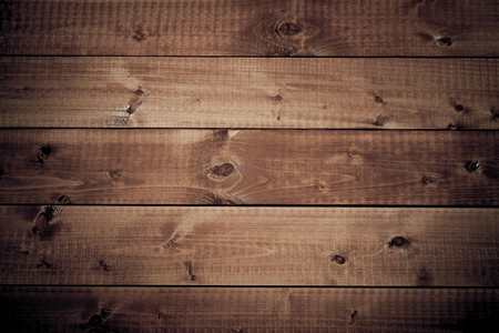 Dark wood brown board background with space for textの写真素材