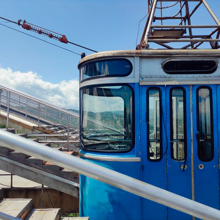 Blue cabin on a panoramic cable car.の写真素材