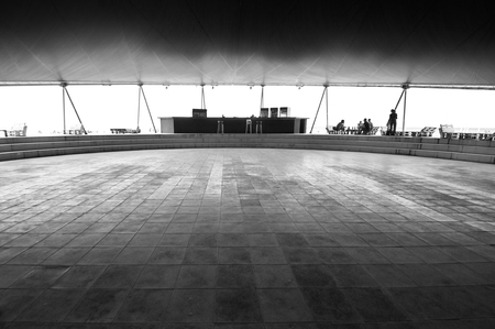 Popovka, Crimea, Russia - August 19, 2017: Architectural art construction of dancefloor with bar on beach. Ex fest Kazantip. Black and white image.のeditorial素材