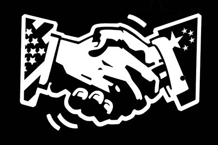 stencil drawing white on black painted wall of a handshake with usa and china flagsの写真素材