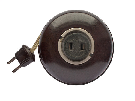 vintage brown bakelite extension cord over white