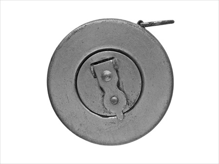 vintage metal measuring tape over whiteの写真素材