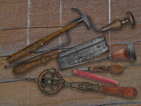 vintage woodworking tools over weathered drift wood backgroundの写真素材