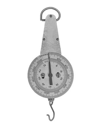 vintage spring scale over white, clipping pathの写真素材