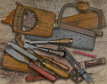 vintage woodworking  tools over wooden benchの写真素材