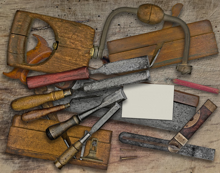 vintage woodworking  tools over wooden bench, business card for your textの写真素材