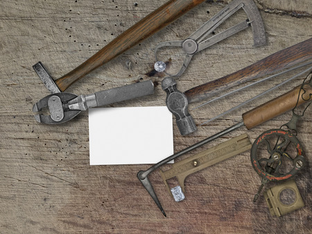 vintage jeweler tools and diamonds over wooden bench, space for your business nameの写真素材