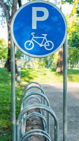 Bike Parking Sign and Rack in the Parkの写真素材