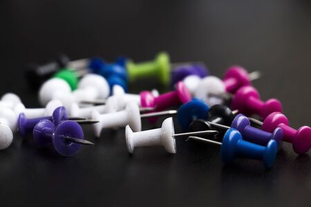 Drawing pins on the tableの写真素材