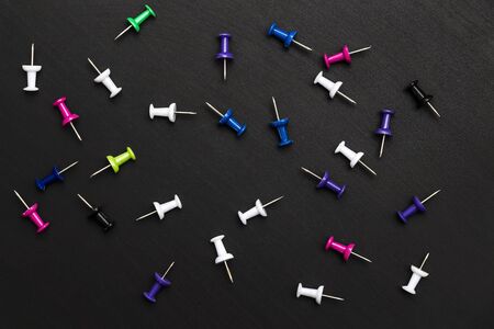 Drawing pins on the tableの写真素材