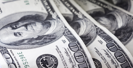 Dollars are loose randomly on the tableの写真素材