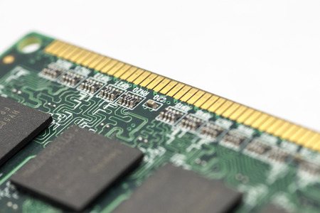 Computer chip closeup on a white background.