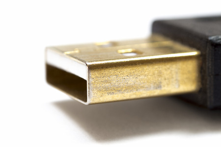Part of USB connector close-up on a white background.