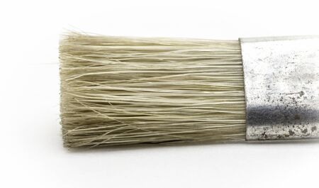 Part of the construction brush close-up on a white background.の写真素材