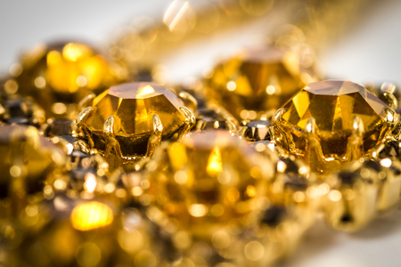 Beautiful yellow jewelery close-up as an abstraction.の写真素材