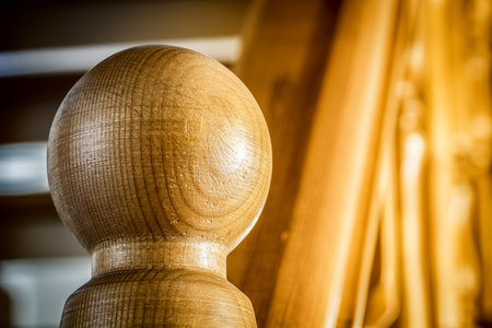 Baluster wooden stairs of a private house close-up.の写真素材