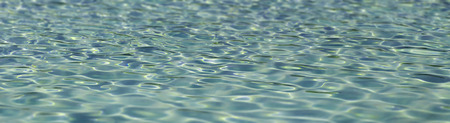 Surface of azure water in a swimming pool.の写真素材