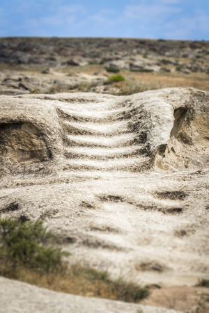 A staircase paved in stony rocks at the site of ancient people's settlement.の写真素材