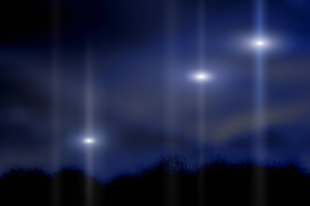 Glowing unidentified objects in the night sky.の写真素材